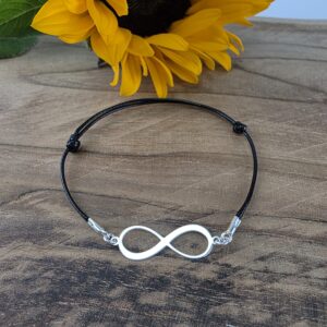 Bransoletka srebrna sznurkowa czarna  zawierająca znak nieskończoności